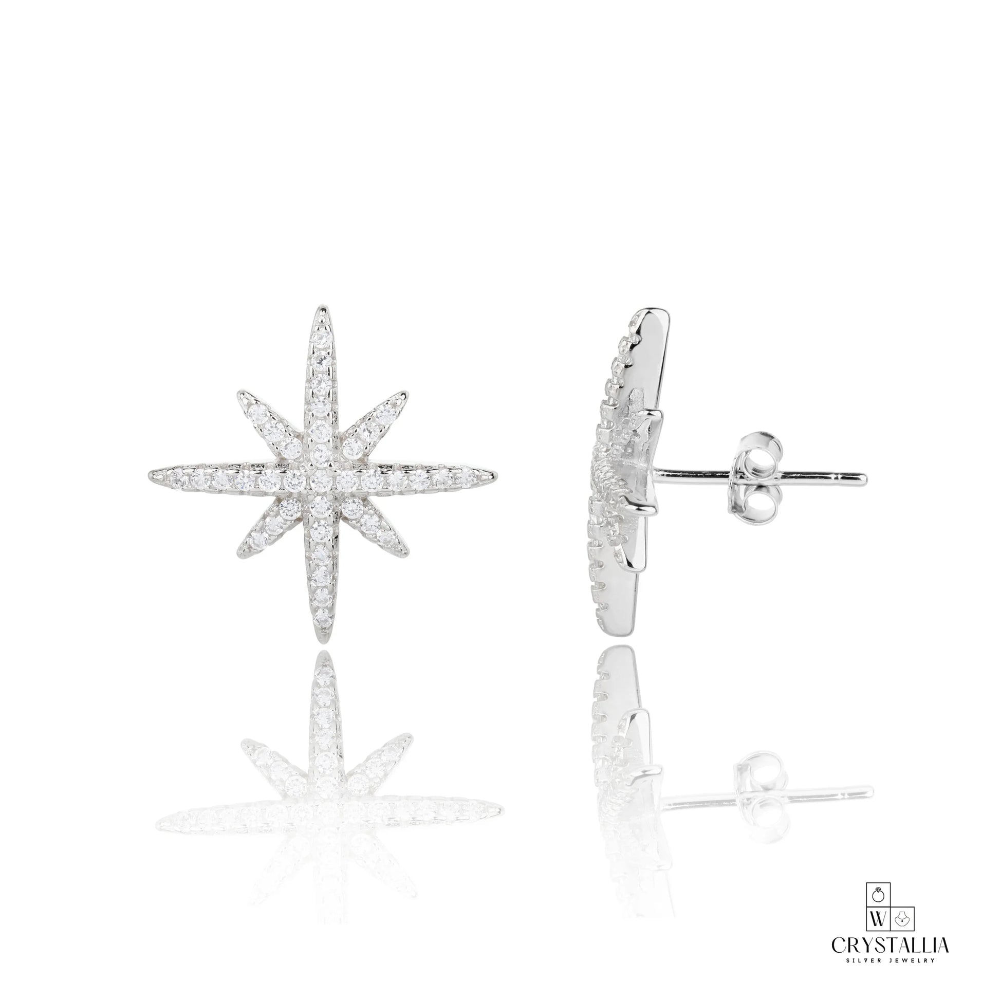 תקריב של עגילי כסף טהור מדגם ZSI156-1 מבית קריסטליה, המציגים גימור מלוטש ועיצוב יוקרתי המתאים לכל סגנון לבוש.