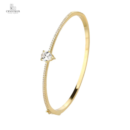 צמיד קשיח לנשים דגם KSI8027-3 עשוי פליז בציפוי זהב 14K עבה (2 מיקרון) משובץ באבני קריסטל מנצנצות על רקע נקי