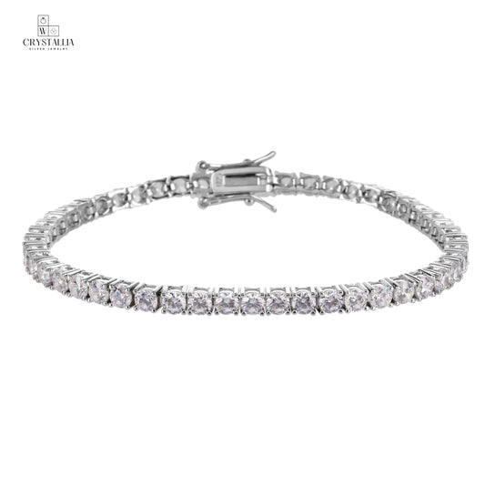 צמיד טניס אלגנטי בגימור כסוף עם שיבוץ אבנים נוצצות לכל אורכו, רוחב 3.5 מ"מ, דגם ZSI005-1 של מותג קריסטליה